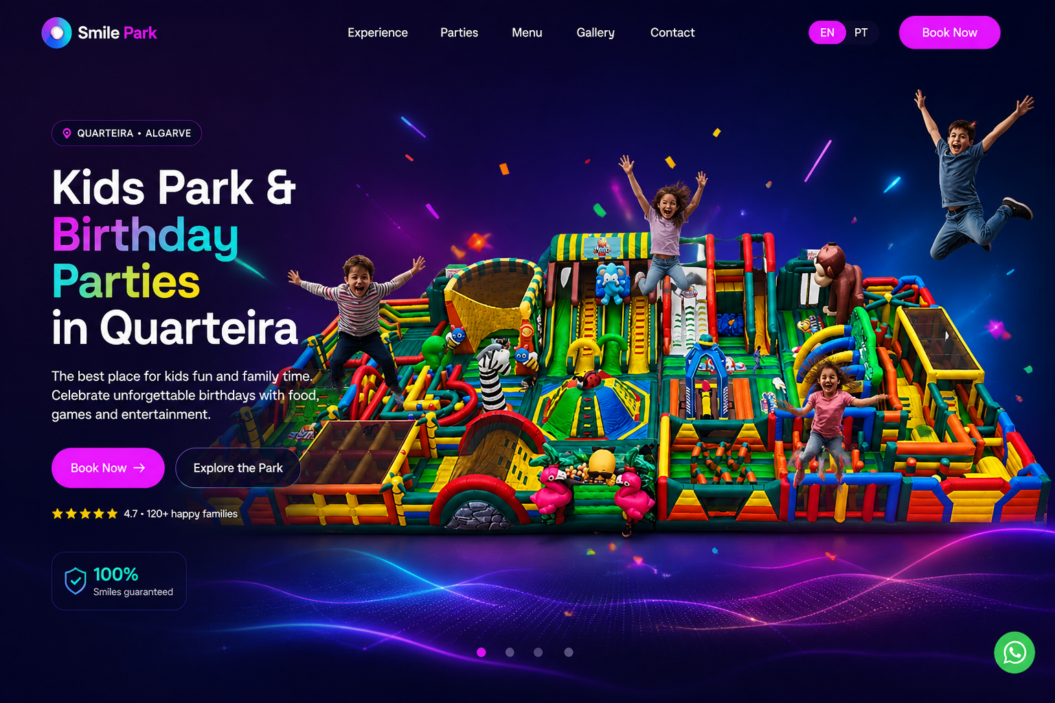 Kids jumping around a colorful inflatable playground at Smile Park